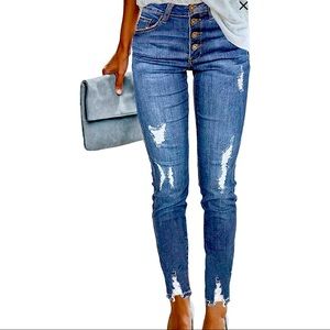 Stretchy skinny jeans, distressed medium wash